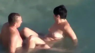 Wave knocks her off his penis